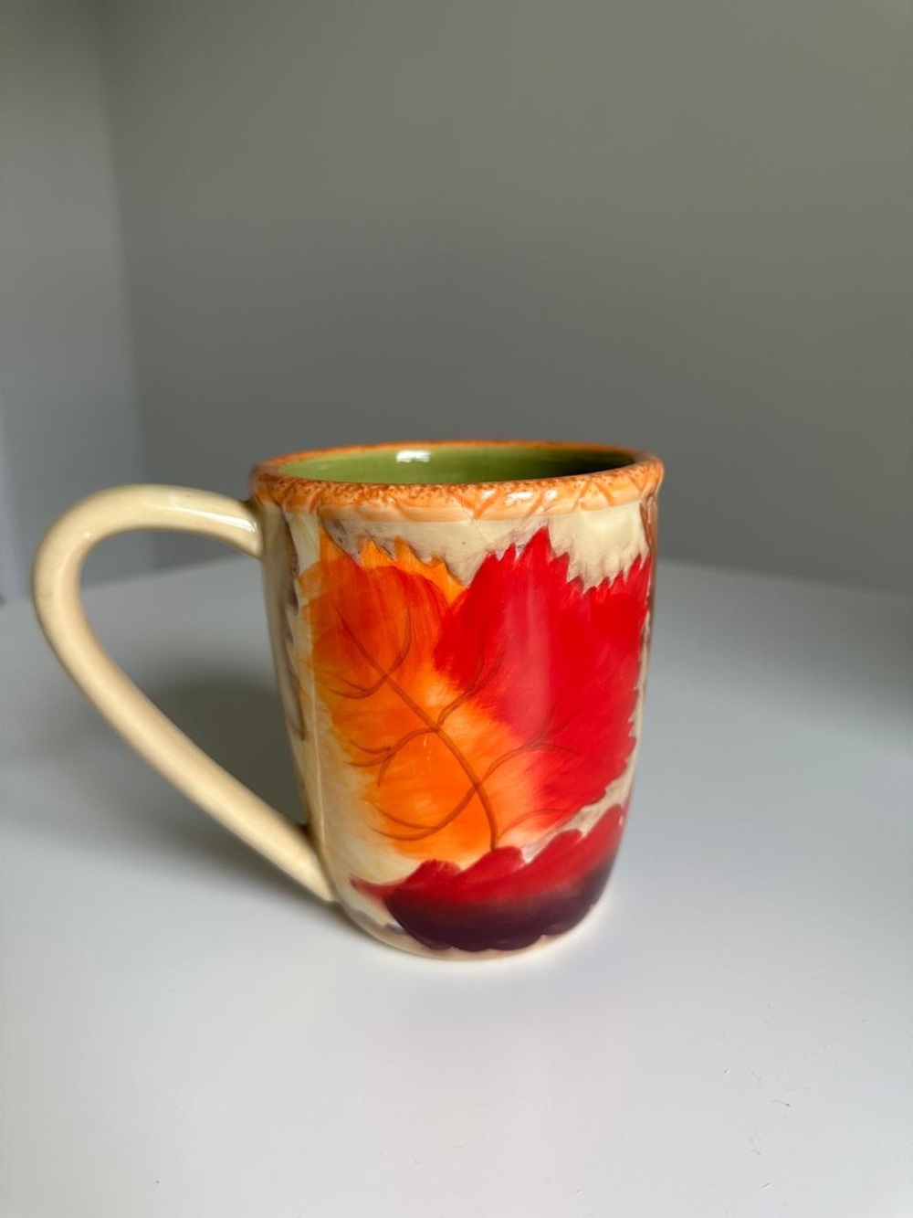 Hand-Painted Ceramic Coffee Mug in Red & Orange Leaf Design